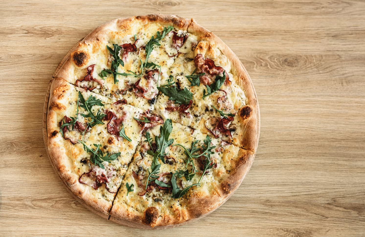 Italian pizza with fresh basil