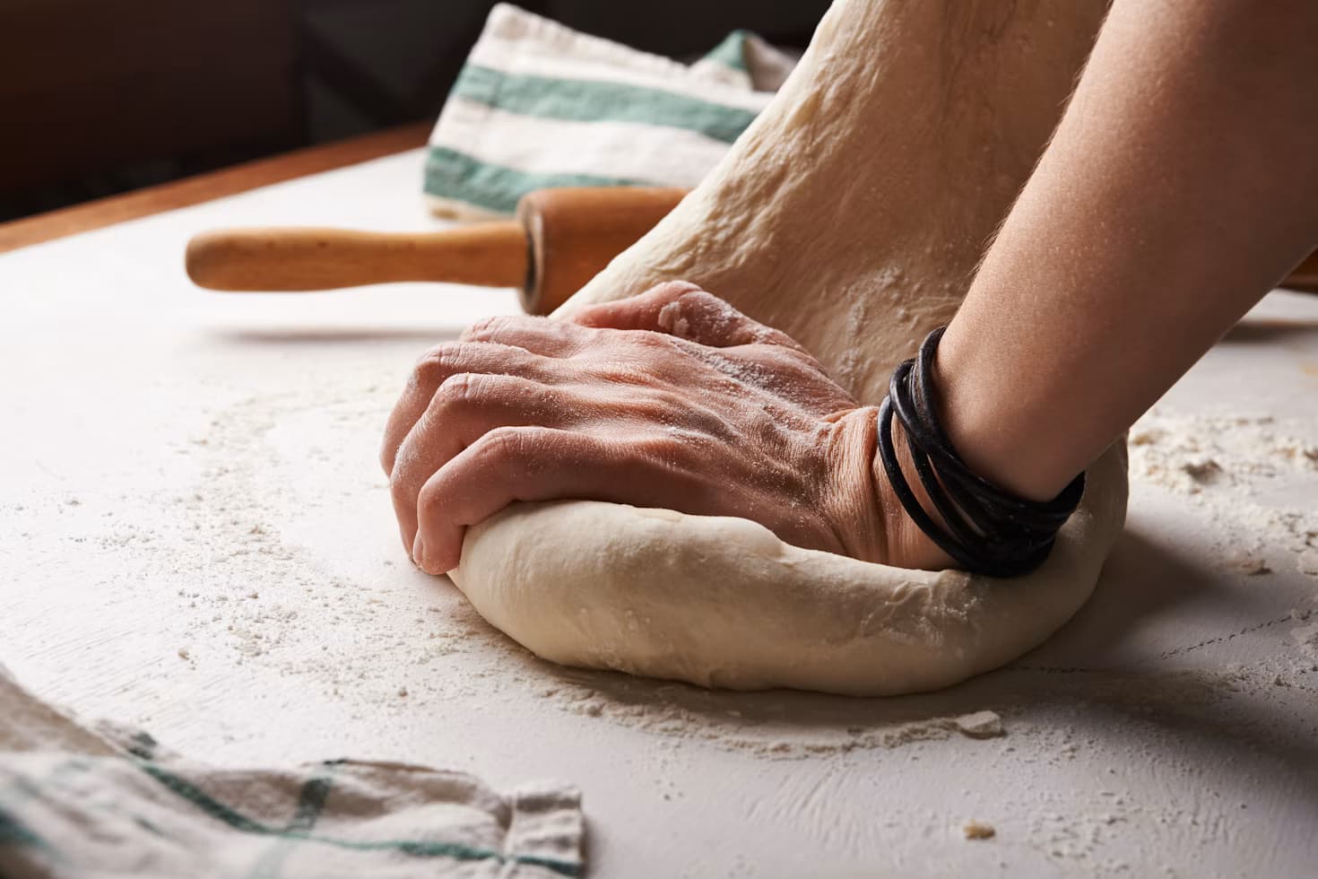 Pizza dough stretched by hand