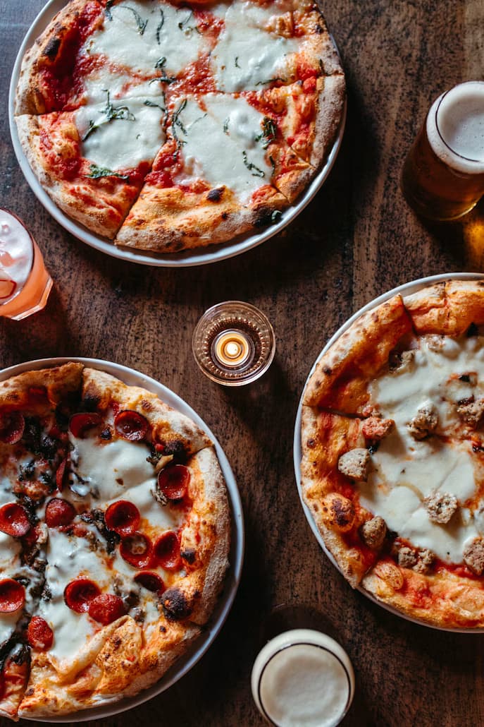 Wood-fired pizzas ready to serve